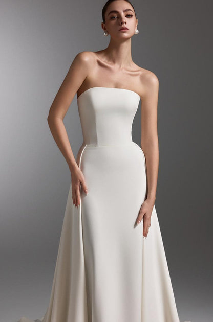 VESTIDO SILUETA SIRENA CON SOBREFALDA INCORPORADA - CELESTE